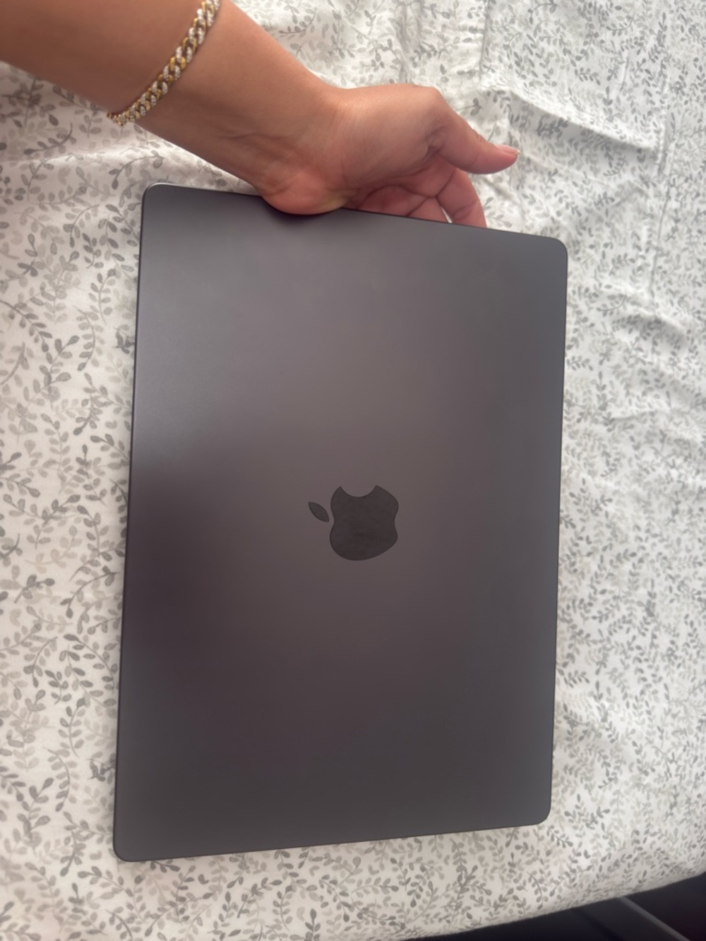 Apple MacBook in Space Gray with Apple logo